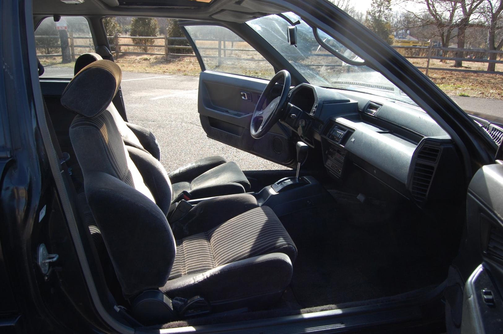 1987 Black /Gray Honda Prelude Si (JHMBA3248HC) with an 2.0L 4 cylinder engine, Automatic transmission, located at 6528 Lower York Road, New Hope, PA, 18938, (215) 862-9555, 40.358707, -74.977882 - Here we have a 1987 Honda Prelude SI with a 2.0L 4 cylinder putting power to the front wheels via an automatic transmission. Options include: gray cloth, power windows/locks/mirrors, AM/FM/TAPE radio, heat/AC, cruise control, tilt steering wheel, 13 inch alloy wheels, pop up headlights and a moon ro - Photo#16